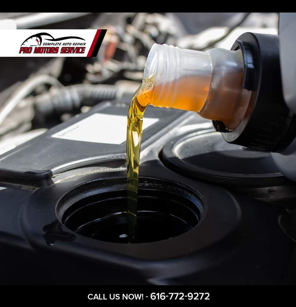 Oil Change Duration Pro Motors Service oil change promotion showing oil being poured into an engine.