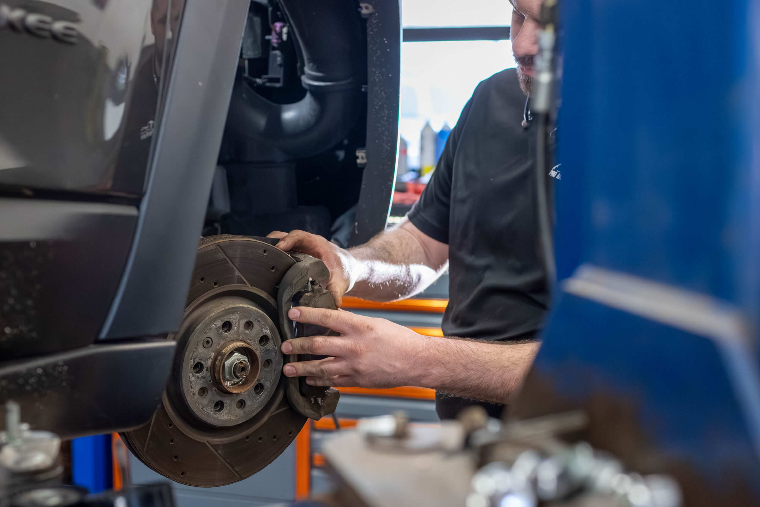 Tech Adjusting Break Pad On Rotor